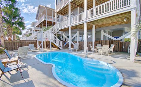 Barefoot beach house - Feb 1, 2024 - Entire townhouse for $325. Built in 2019, a beautiful townhome on North Padre Island offers a bright, coastal interior with plenty of space. 3 balconies and covered patio en... 